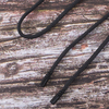 Шнур круглый декор наконечник металл надпись резьба 130см черный уп 2 шт фото